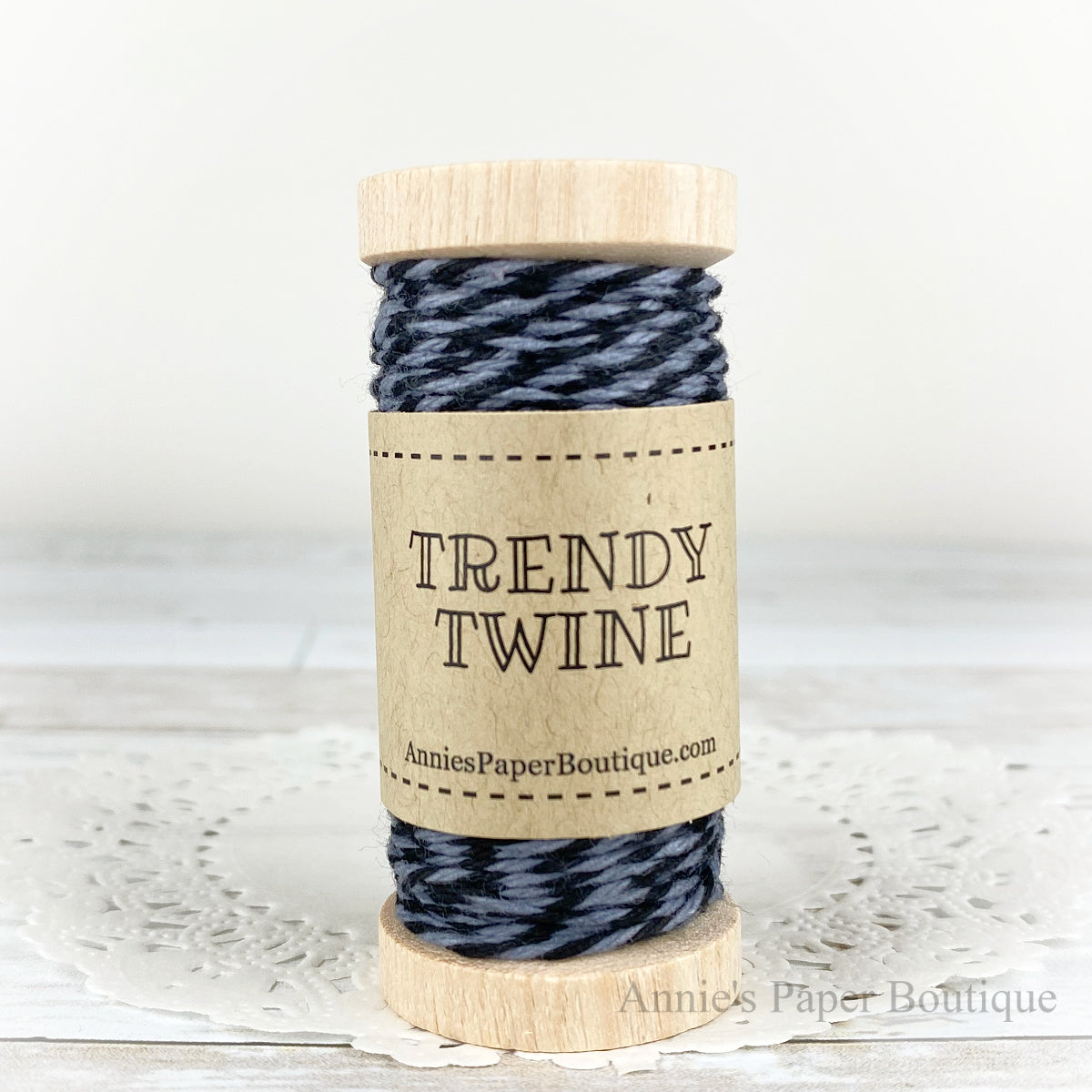 Gray Licorice Petite Trendy Twine. Black and gray string on a wooden spoo.
