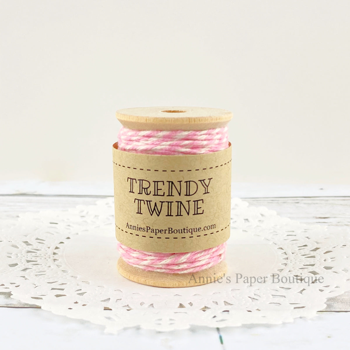 Posy Petite Trendy Twine. Pink and natural white string on a wooden spool.