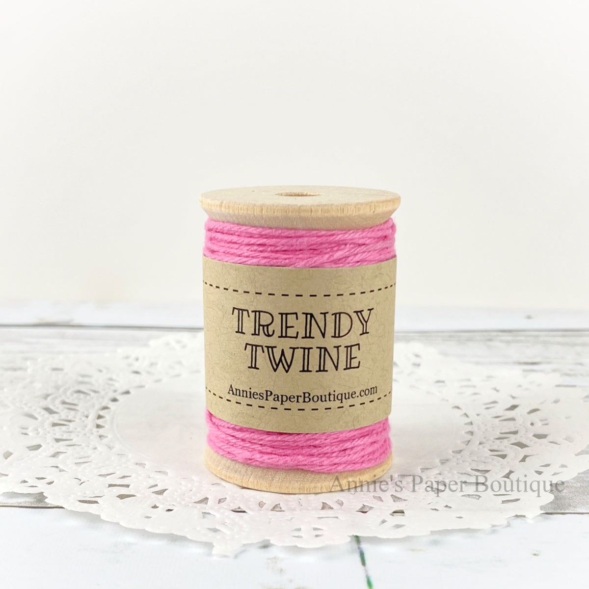 Totally Pink Petite Trendy Twine. Solid pink string on wooden spool.