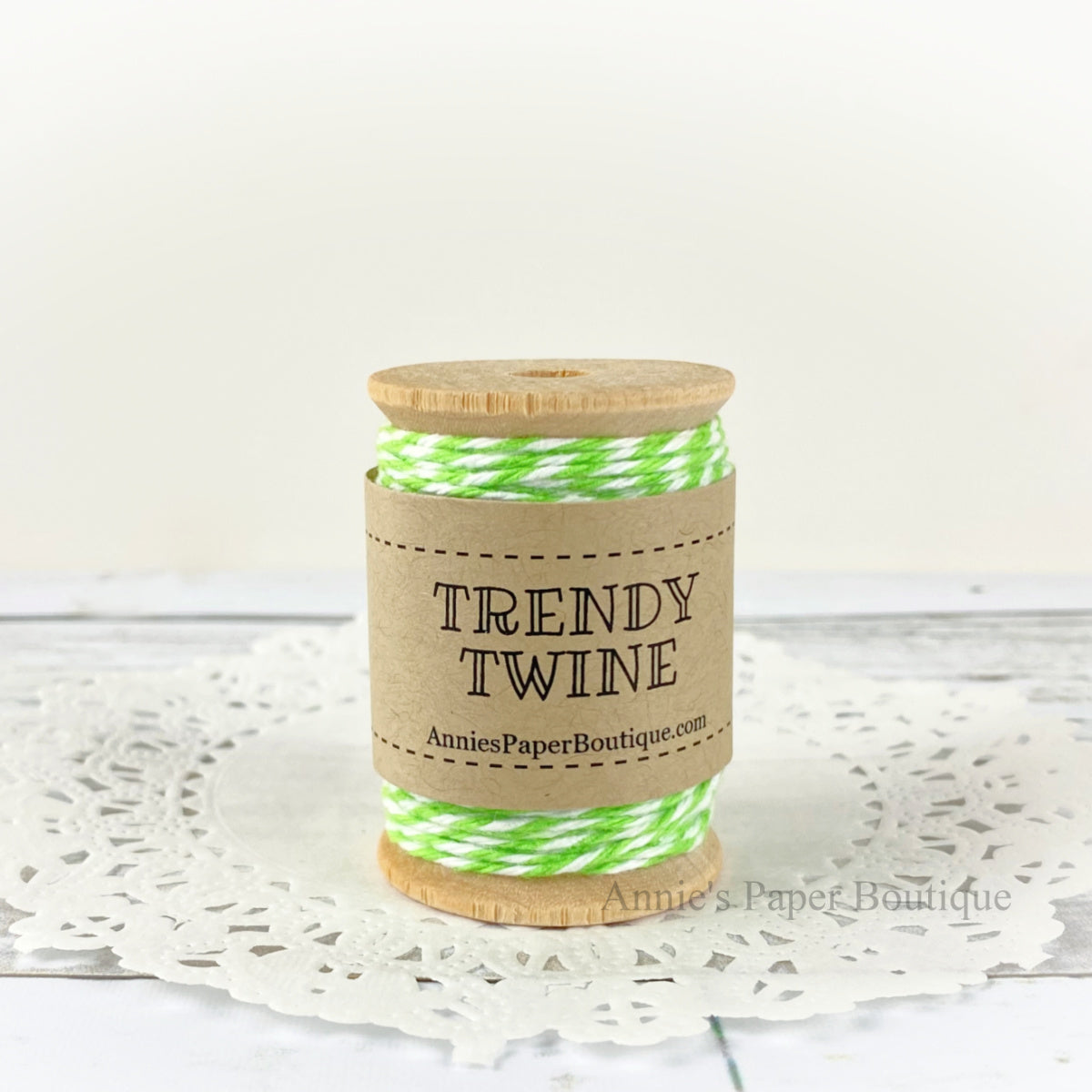 Limeade Petite Trendy Twine. Lime green and white string on a wooden spool.