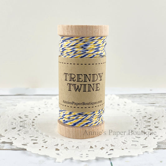 Nautical Petite Trendy Twine. Yellow, white, and navy string on a wooden spool.