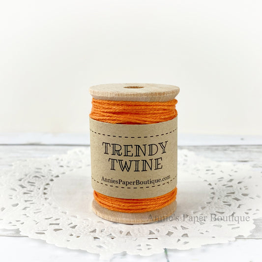 Totally Pumpkin Petite Trendy Twine. Solid orange string on wooden spool.