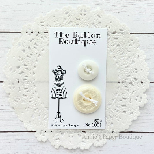 White Buttons on a vintage inspired tag